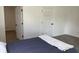 Neutrally painted bedroom boasts a calming ambiance, and features soft carpeting at 321 S 23Rd St, Elwood, IN 46036