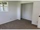Charming carpeted bedroom with a closet and sunlit window at 321 S 23Rd St, Elwood, IN 46036