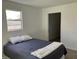 Cozy bedroom featuring a comfortable bed, neutral carpet and a bright window at 321 S 23Rd St, Elwood, IN 46036