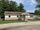 Charming single story home featuring stone facade and cozy front porch at 321 S 23Rd St, Elwood, IN 46036