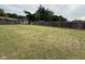 Fenced backyard provides ample space for outdoor activities and features a storage shed at 3327 Boxwood Dr, Indianapolis, IN 46227