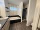 Bathroom features tub, separate shower, vanity with drawers and cabinets at 3327 Boxwood Dr, Indianapolis, IN 46227