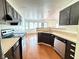 Modern kitchen with stainless appliances and a view of the dining area at 3327 Boxwood Dr, Indianapolis, IN 46227