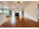 Bright living room with vaulted ceilings, hardwood floors and fireplace at 3327 Boxwood Dr, Indianapolis, IN 46227