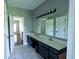 Bathroom with double vanity, ample counter space, and good lighting at 3610 Homestead Pl, Plainfield, IN 46168