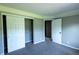 This bedroom includes neutral walls, carpeted floors, and closet with shelving at 3610 Homestead Pl, Plainfield, IN 46168
