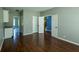 Spacious living room with hardwood floors and open access to other areas of the home at 3610 Homestead Pl, Plainfield, IN 46168