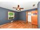 Bedroom offering closet space, a window view, and a comfortable ceiling fan at 3636 Oakwood Dr, Anderson, IN 46011