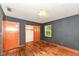 Bedroom showcasing a closet and a window providing natural light at 3636 Oakwood Dr, Anderson, IN 46011