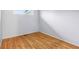 Empty bedroom features hardwood floors, neutral paint, and natural light at 3921 S Lasalle St, Indianapolis, IN 46237