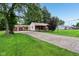 A cozy home with a well-kept lawn and a two-car garage, perfect for a Gathering at 3921 S Lasalle St, Indianapolis, IN 46237