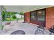 View of the covered front porch with outdoor furniture, providing a relaxing space at 3921 S Lasalle St, Indianapolis, IN 46237