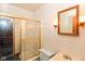 Bathroom with glass shower door, and vintage fixtures at 3965 Alsace Pl, Indianapolis, IN 46226