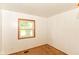 Cozy bedroom with a window allowing natural light and neutral wall colors at 3965 Alsace Pl, Indianapolis, IN 46226