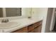 Bathroom showcasing a double vanity with a large mirror at 403 Bagley Ln, Indianapolis, IN 46231