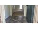 Inviting entryway featuring durable flooring and a glimpse into the spacious living area at 403 Bagley Ln, Indianapolis, IN 46231