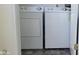 A laundry room with a washing machine and dryer in a well-lit space at 403 Bagley Ln, Indianapolis, IN 46231