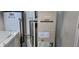 A utility room with a water heater, furnace, and laundry equipment at 403 Bagley Ln, Indianapolis, IN 46231