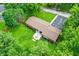 Lovely home aerial view featuring lush greenery and a backyard deck at 4132 Tincher Rd, Indianapolis, IN 46221