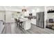 A spacious, updated kitchen featuring an island, stainless steel appliances, and ample cabinetry at 4132 Tincher Rd, Indianapolis, IN 46221