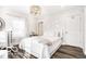 Bright and airy bedroom with modern lighting and neutral decor at 48 E Palmer St, Indianapolis, IN 46225