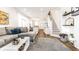 Open-concept living area with hardwood floors and contemporary furnishings at 48 E Palmer St, Indianapolis, IN 46225