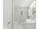 Modern bathroom featuring updated fixtures, stylish tile, and a large vanity at 508 W 38Th St, Indianapolis, IN 46208