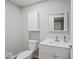 A full bathroom featuring white cabinets, sleek fixtures, and a stylish design at 508 W 38Th St, Indianapolis, IN 46208