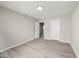 Large bedroom with light gray walls, updated floors, and two closets at 508 W 38Th St, Indianapolis, IN 46208
