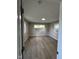 This spacious bedroom includes two windows and wood-look flooring at 508 W 38Th St, Indianapolis, IN 46208
