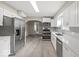 Modern kitchen with white cabinets, stainless steel appliances, and updated countertops at 508 W 38Th St, Indianapolis, IN 46208