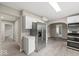 Newly renovated kitchen with modern appliances, white cabinetry, and updated floors at 508 W 38Th St, Indianapolis, IN 46208