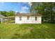 Back view of home with large backyard at 523 Patterson Rd, Columbus, IN 47203