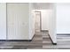 Hallway with durable vinyl floors that leads to a bathroom and bedrooms at 523 Patterson Rd, Columbus, IN 47203