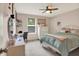 Charming bedroom featuring a desk, dresser, and a comfortable-looking bed at 5306 Lavender Dr, Plainfield, IN 46168