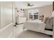 Inviting bedroom with a plush bed, dresser, and a bright window at 5306 Lavender Dr, Plainfield, IN 46168
