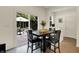Eat-in kitchen/dining area leading to an outdoor patio with ample seating and lots of natural light at 5306 Lavender Dr, Plainfield, IN 46168