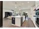Open-concept kitchen featuring an island with stainless steel dishwasher, and eat-in kitchen nook at 5306 Lavender Dr, Plainfield, IN 46168
