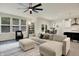 Comfortable living room with a sectional sofa, lots of natural light and an open layout at 5306 Lavender Dr, Plainfield, IN 46168