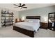 Comfortable main bedroom featuring a ceiling fan, nightstands, and bookshelf at 5306 Lavender Dr, Plainfield, IN 46168