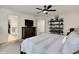 Spacious main bedroom featuring a closet, dresser, and ceiling fan at 5306 Lavender Dr, Plainfield, IN 46168