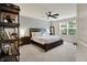 Cozy main bedroom with a ceiling fan, plush bed, and abundant natural light at 5306 Lavender Dr, Plainfield, IN 46168