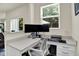 Inviting office with dual monitor setup, lots of work space and natural light at 5306 Lavender Dr, Plainfield, IN 46168