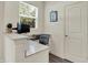 Bright office space featuring a window view, desk, and a neutral color palette at 5306 Lavender Dr, Plainfield, IN 46168