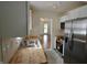 Updated kitchen boasts butcher block countertops, stainless steel appliances, and ample storage at 5430 E 17Th St, Indianapolis, IN 46218