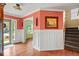 Inviting entryway with hardwood floors, elegant wainscoting, and access to a bright, airy office at 5960 Dado Dr, Noblesville, IN 46062