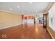 Bright, open-concept living area with hardwood floors and easy access to the kitchen at 5960 Dado Dr, Noblesville, IN 46062