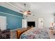 Spacious main bedroom with a large bed, vaulted ceiling, and en suite bathroom at 5960 Dado Dr, Noblesville, IN 46062