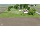 Aerial shot of a home on a large lot with farm fields, offering privacy and scenic views at 5964 N Pr Wind Drift Ln, Shelbyville, IN 46176