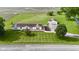 Aerial shot of ranch home on a expansive lot with large yard and a detached garage at 5964 N Pr Wind Drift Ln, Shelbyville, IN 46176